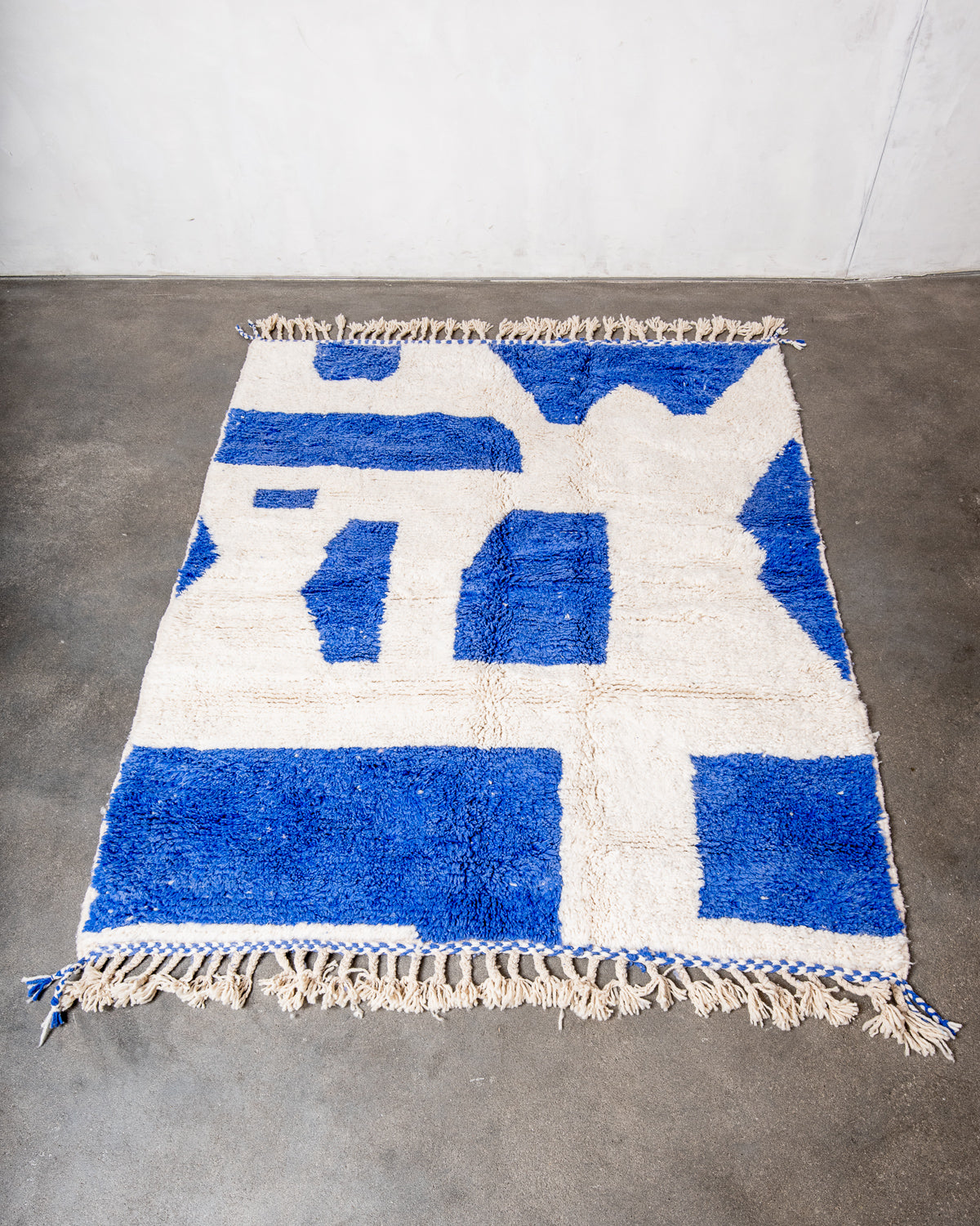 Modern, designer, handcrafted Berber rug from Morocco. Beniourain carpet with beautiful colours and patterns and fluffy wool texture.